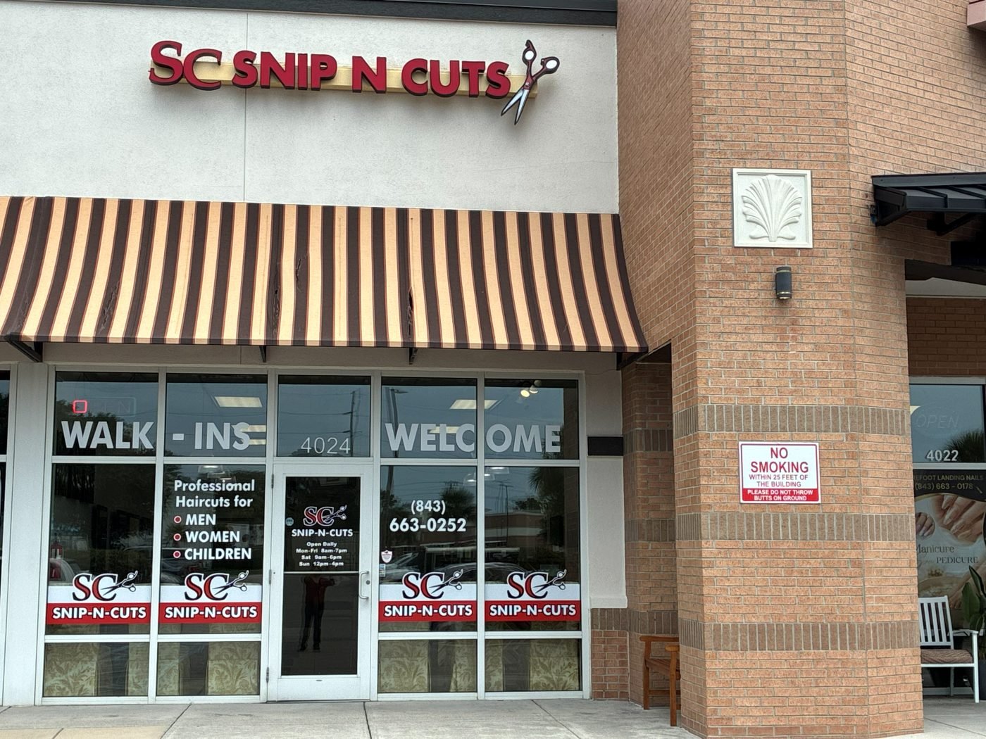 The Snip-N-Cuts storefront on Highway 17 S
