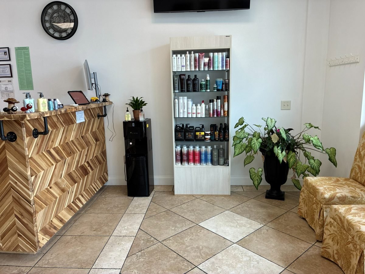 The front counter and retail shelf inside the salon